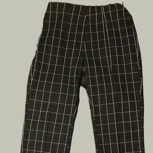 Classic Black Dress Pant With White Striped Pattern and Slits at the Ankles